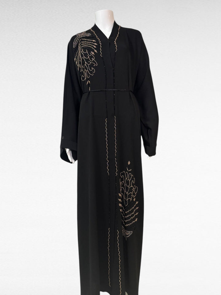 Stilvolle schwarze Abaya mit eleganter Goldstickerei - Abaya Couture